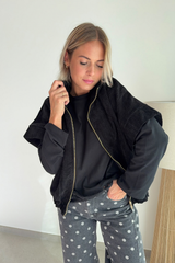 Veste en velours noir sans manche