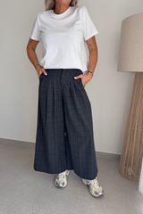 Pantalon à carreaux noir
