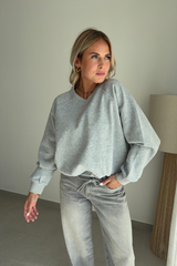Sweat gris col V