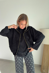 Veste en velours noir sans manche