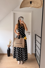 Robe noir a pois