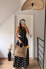 Robe noir a pois